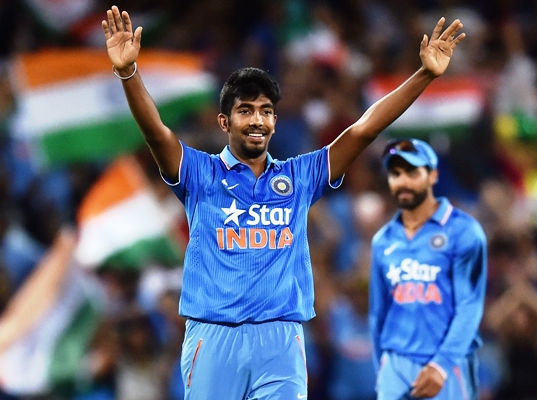 Jasprit Bumrah of India reacts after taking an Australian wicket 