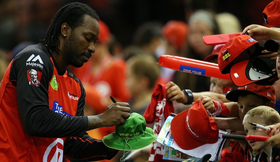 Chris Gayle signs autographs during a Big Bash 2016 game. Photograph: Graham Denholm/Getty Images