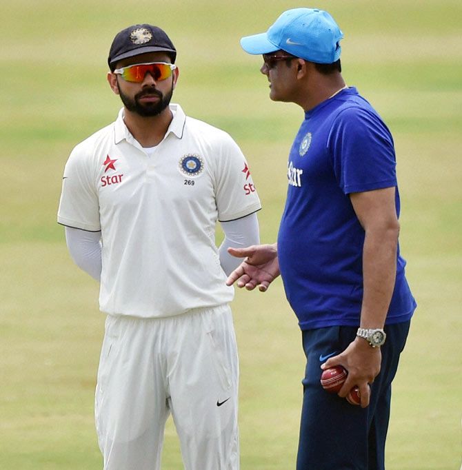 India's Test skipper Virat Kohli, left, with coach Anil Kumble