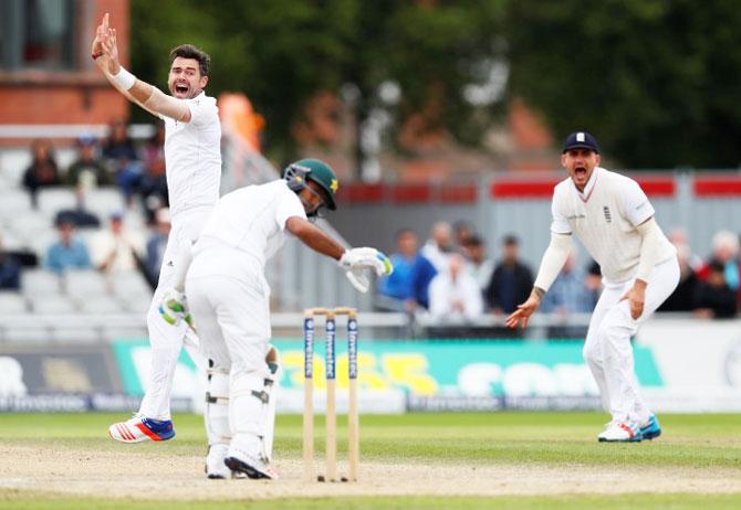 England's James Anderson celebrates taking the wicket of Pakistan's Asad Shafiq on Day 4 of the 2nd Test at Old Trafford in Manchester on Monday