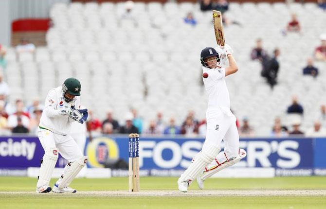 England's Joe Root cuts a ball