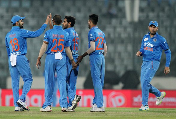 Indian players celebrate after the fall of a UAE wicket during their Asia Cup match in Mirpur 