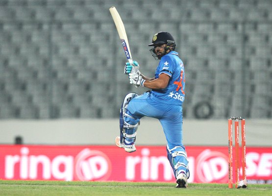 India's Rohit Sharma plays a shot during their Asia Cup match against UAE 