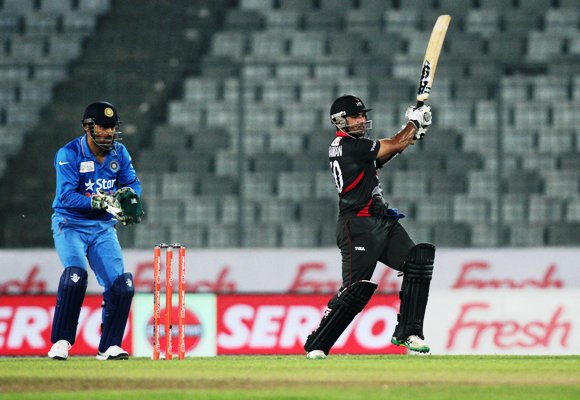 United Arab Emirates' batsman Shaiman Anwar plays a shot during the Asia Cup 