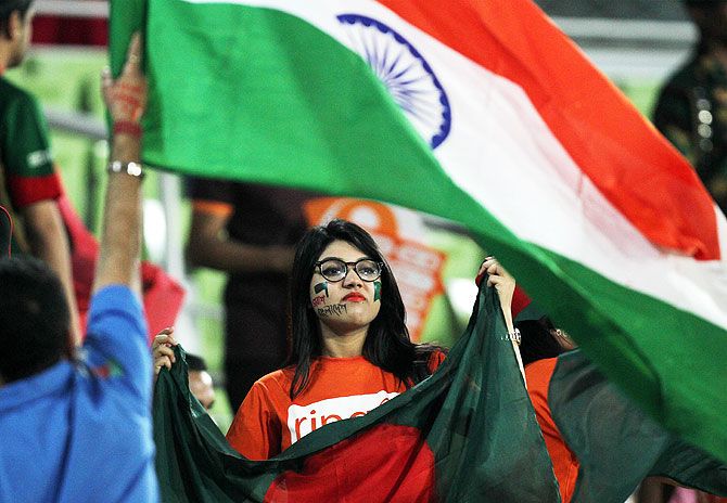 A Bangladesh fan watches the proceedings of the Asia Cup final between India and Bangladesh at the Sher-e-Bangla National Stadium in Dhaka on Sunday