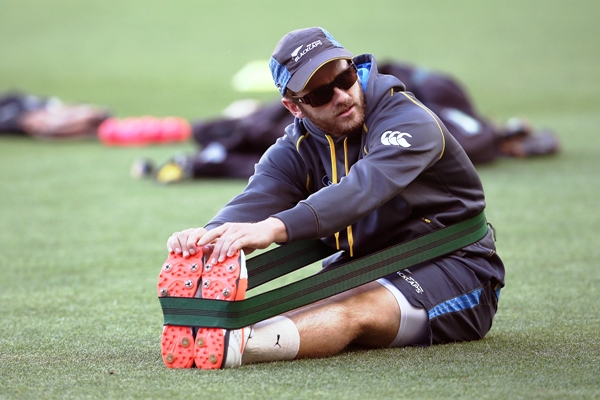 Kane Williamson of New Zealand stretches during a team training session 