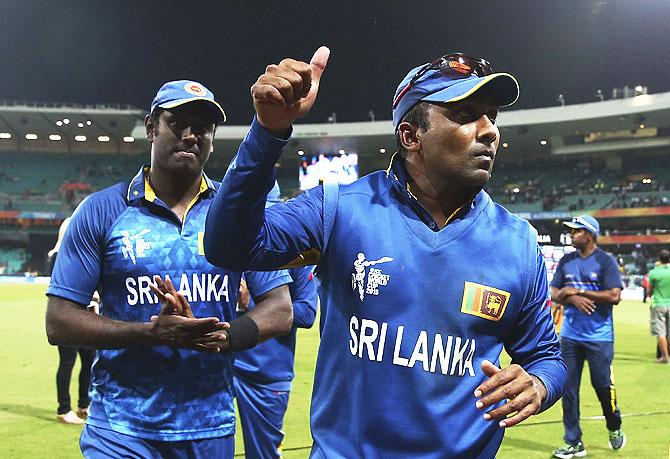 Mahela Jayawardene (centre) and Angelo Mathews