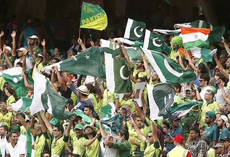 Fans of Pakistan's World Cup cricket team fly their flags during the 2015 cricket World Cup match against India in Adelaide