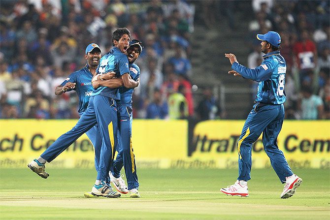 Sri Lanka pacer Kasun Rajitha celebrates after dismissing Rohit Sharma in the first T20 International against India in Pune last month
