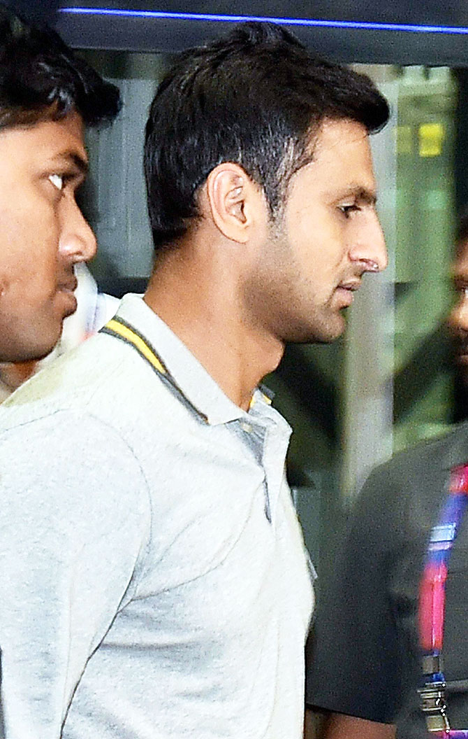 Pakistan's Shoaib Malik arrives with his team