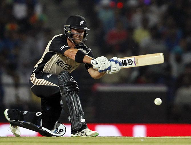 New Zealand's Corey Anderson plays a shot 