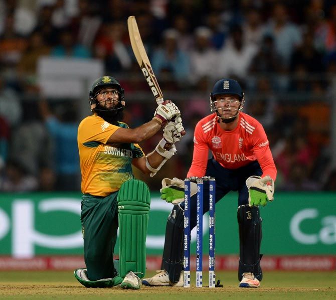 Hashim Amla hits a six against England during the ICC World T20 match against South Africa in Mumbai on Friday