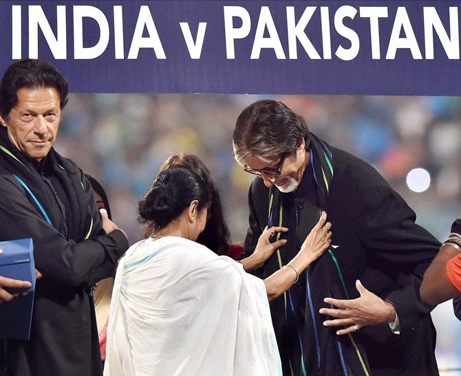Imran Khan, left, as West Bengal Chief Minister Mamata Banerjee felicitates Amitabh Bachchan before the World T20 game between India and Pakistan at the Eden Gardens in Kolkata, March 19, 2016. Photograph: PTI