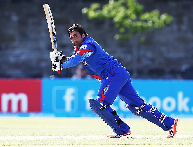 Afghanistan's Asghar Stanikai in action