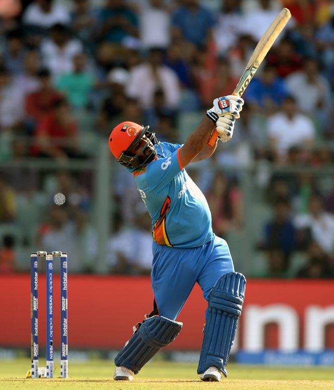 Mohammad Shahzad hits out against South Africa during the ICC World Twenty20 match at the Wankhede Stadium in Mumbai. Photograph: Gareth Copley/Getty Images