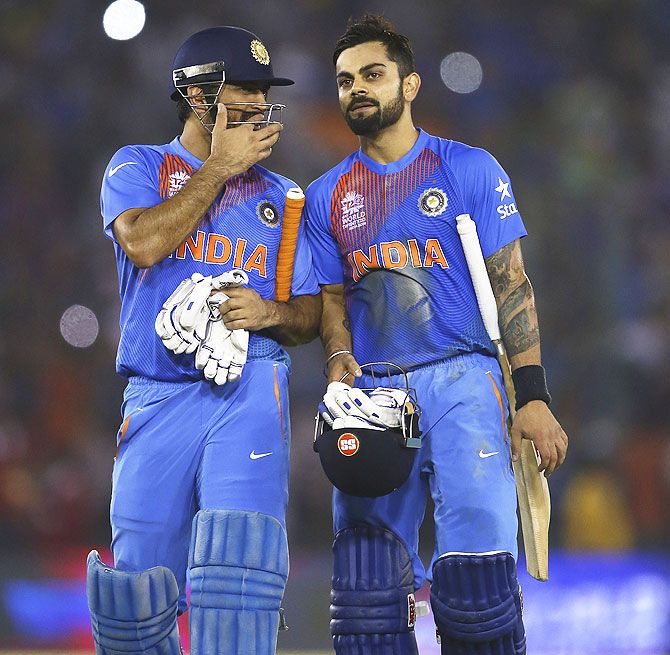 Mahendra Singh Dhoni and Virat Kohli after their victory over Australia on Sunday
