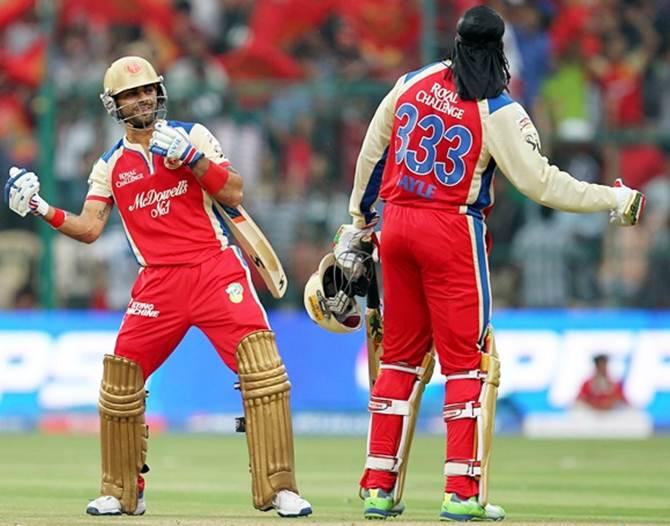 Virat Kohli, left, and Chris Gayle