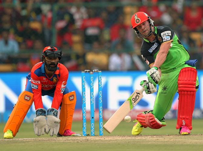 IPL PHOTOS: Kohli, de Villiers slam centuries as RCB demolish Gujarat -  Rediff Cricket