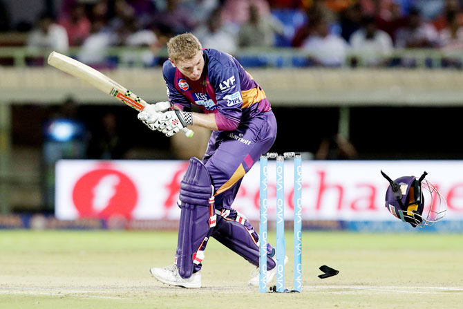 George Bailey tries to take evasive action as he loses his helmet