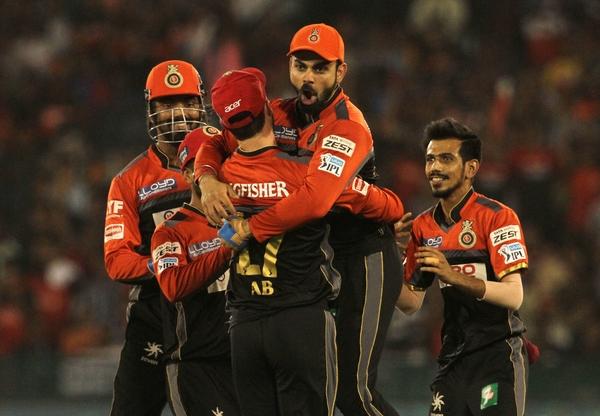 RCB skipper Virat Kohli celebrates with teammates