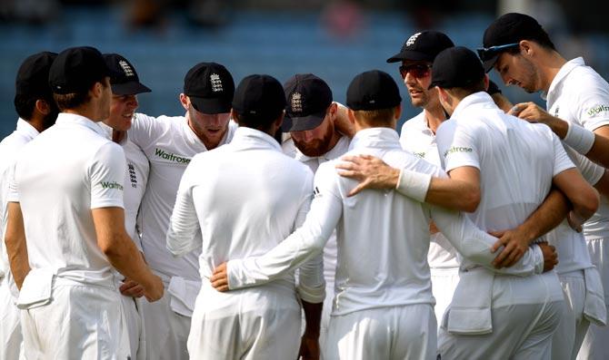 England captain Alastair Cook speaks to his team