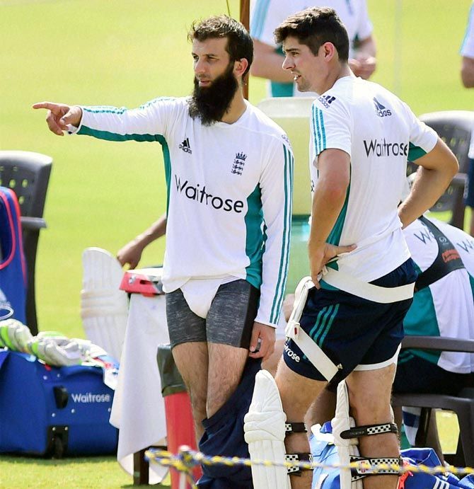 England captain Alastair Cook, right, with Moeen Ali during England's training session at the Cricket Club of India's Brabourne stadium in Mumbai