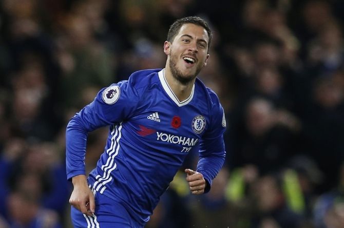 Chelsea's pacy playmaker Eden Hazard is seen as a threat by Arsenal's Aaaron Ramsey
