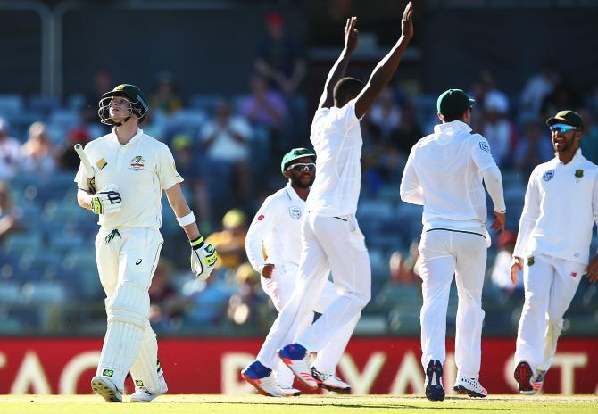 Australia captain Steve Smith walks back to the dressing room after beimng dismissed by South Africa's Kagiso Rabada on Day 4 of the first Test at the WACA in Perth on Sunday