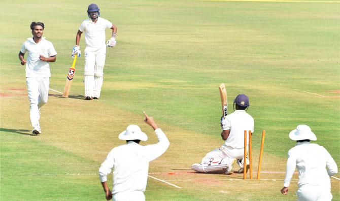 Tamil Nadu captain Abhinav Mukund is dismissed by Punjab bowler Sandeep Sharma during the Ranji Trophy cricket match at VCA stadium in Nagpur on Tuesday