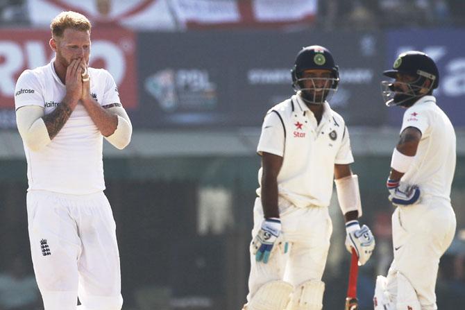 Ben Stokes gestures as Cheteshwar Pujara and Virat Kohli bat on Day 2 on Sunday