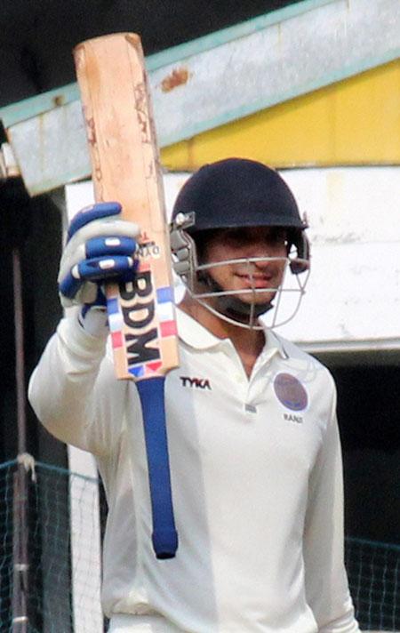 Hyderabad batsman Mehdi Hasan celebrates after scoring a half-century against Goa in the Ranji Trophy match at VCA stadium in Nagpur on Saturday