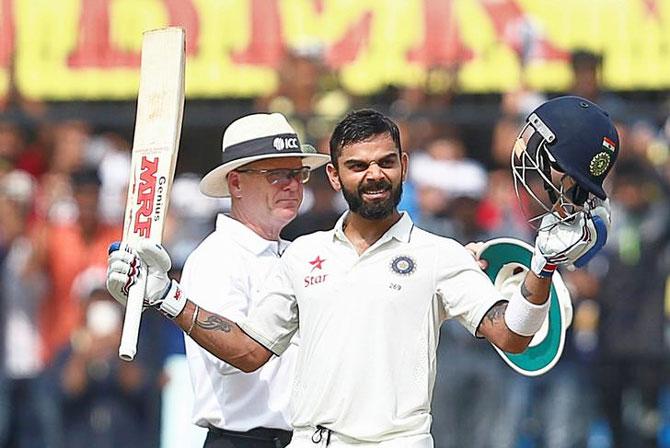 India's Virat Kohli celebrates his double century on Monday