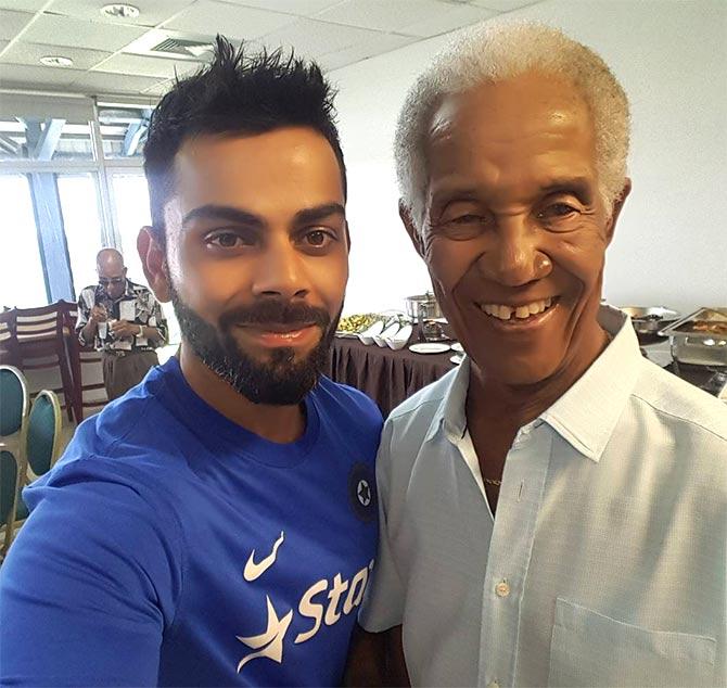 Virat Kohli with Gary Sobers