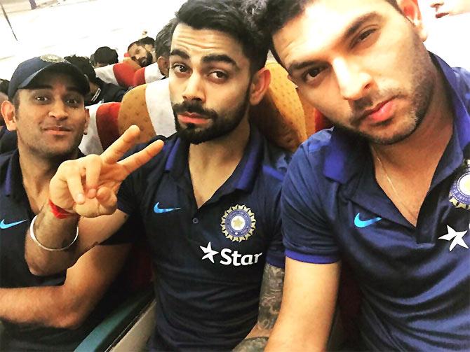 Virat Kohli with Mahendra Singh Dhoni and Yuvraj Singh