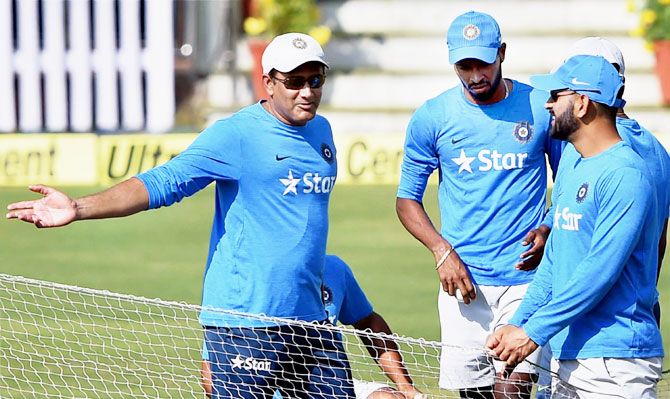 India captain M S Dhoni with coach Anil Kumble and pacer Hardik Pandya during a training session in Ranchi on Tuesday