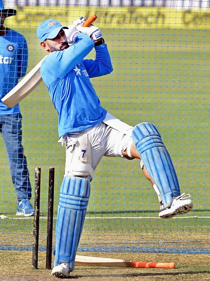 India captain Mahendra Singh Dhoni bats during a training session in Ranchi on Tuesday, the eve of the 4th ODI against New Zealand