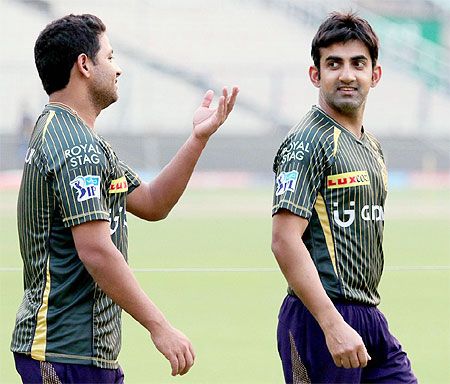 Gautam Gambhir (right) and KKR teammate Piyush Chawla at a training session