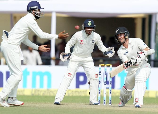 Luke Ronchi of New Zealand plays a shot