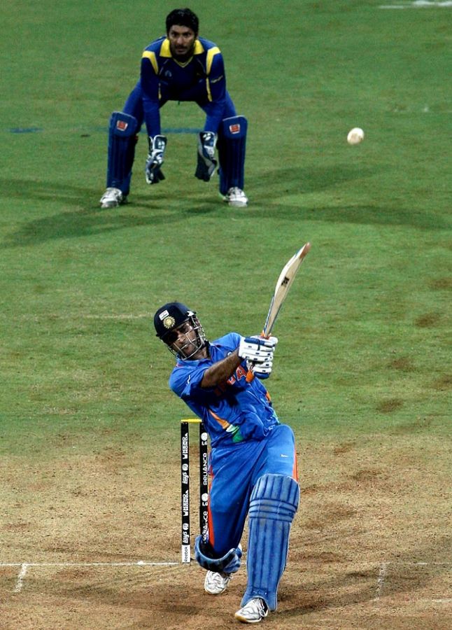 Mahendra Singh Dhoni hits a six to take India to victory against Sri Lanka in the 2011 World Cup final in Mumbai