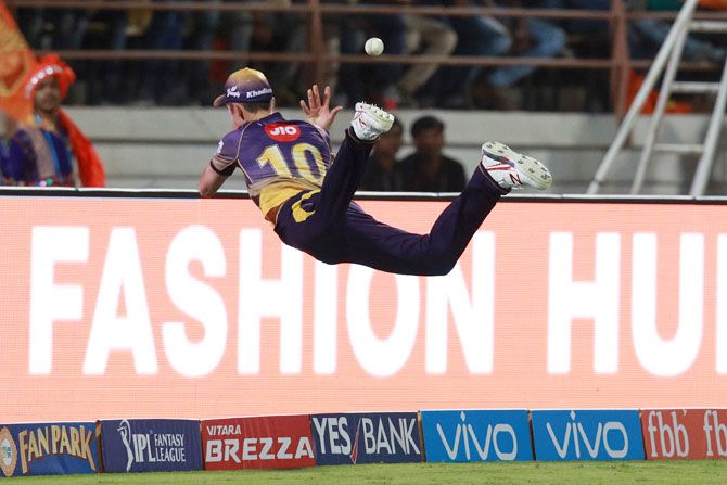 KKR's Trent Boult goes airborne as he fields the ball on the boundary