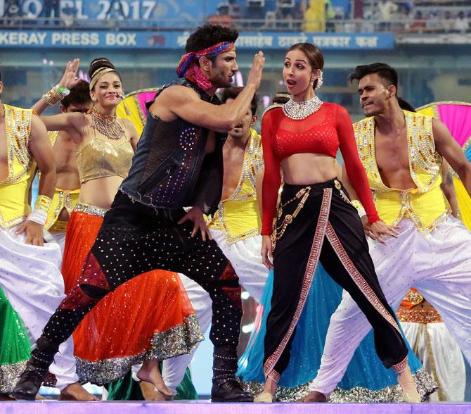 Sushant Singh Rajput, left, performs with Malaika Arora at the Wankhede stadium in Mumbai in 2017