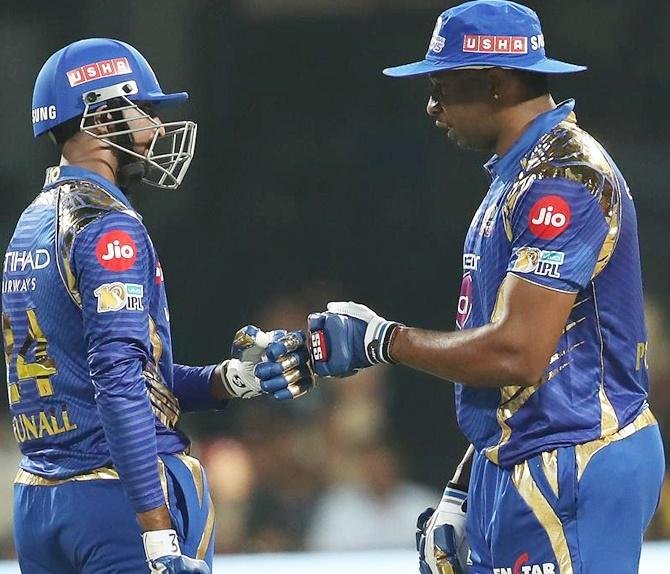 IMAGE: Krunal Pandya of the Mumbai Indians and Kieron Pollard celebrate. Photograph: BCCI