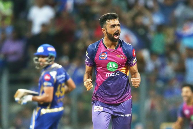 Rising Pune Supergiant's Jaydev Unadkat celebrates after scalping the wicket of Mumbai Indians' Hardik Pandya in the last over during their Indian Premier League match at the Wankhede Stadium in Mumbai on Monday