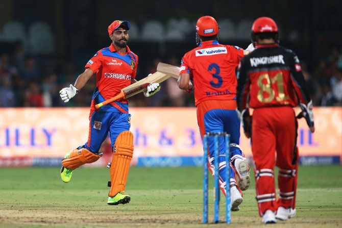 Ravindra Jadeja and captain Suresh Raina celebrate after the latter hit the winning runs