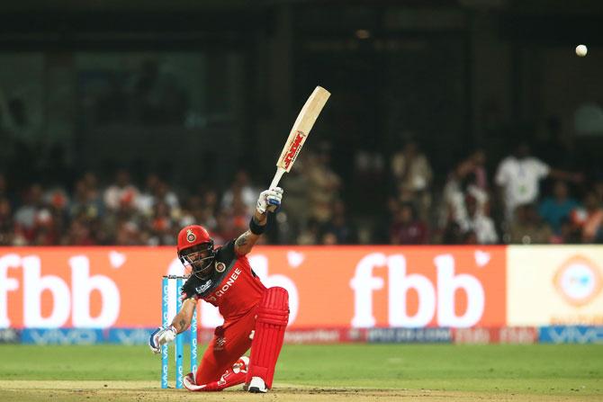 RCB captain Virat Kohli mishits the ball