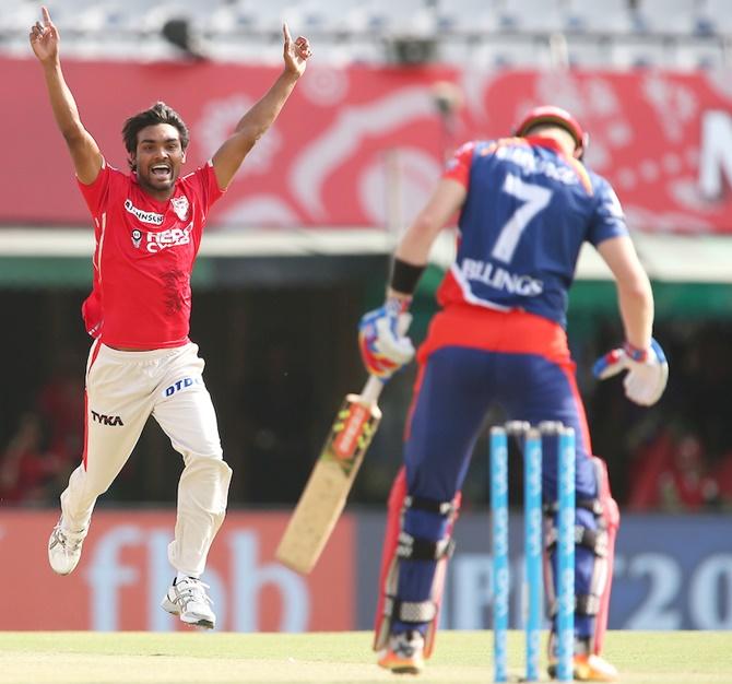 KXIP's Sandeep Sharma celebrates the wicket of Delhi Daredevils' Sam Billings