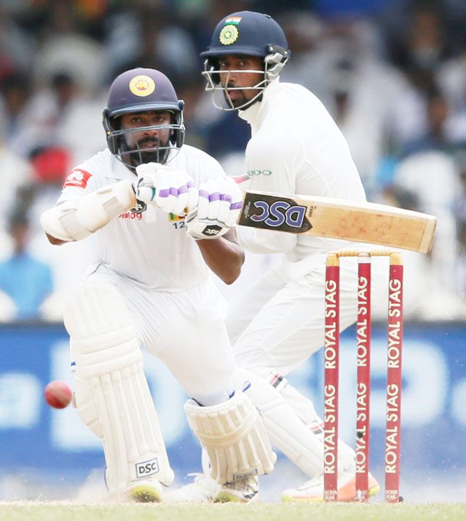 Sri Lanka's Niroshan Dickwella plays a shot during his 51-run innings