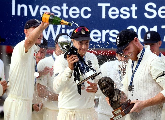 England's players celebrate winning the series against South Africa on Monday