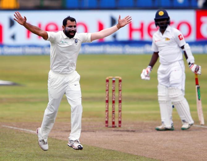 Mohammed Shami appeals successfully for the wicket of Malinda Pushpakumara