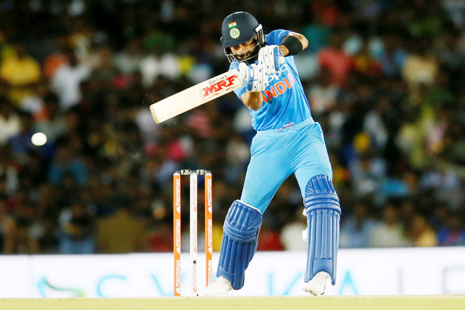 Virat Kohli en route his half-century 